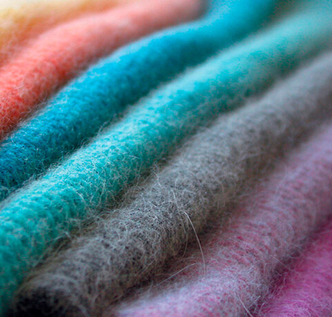 THEIR ANSWER TO DARK SWEATERS